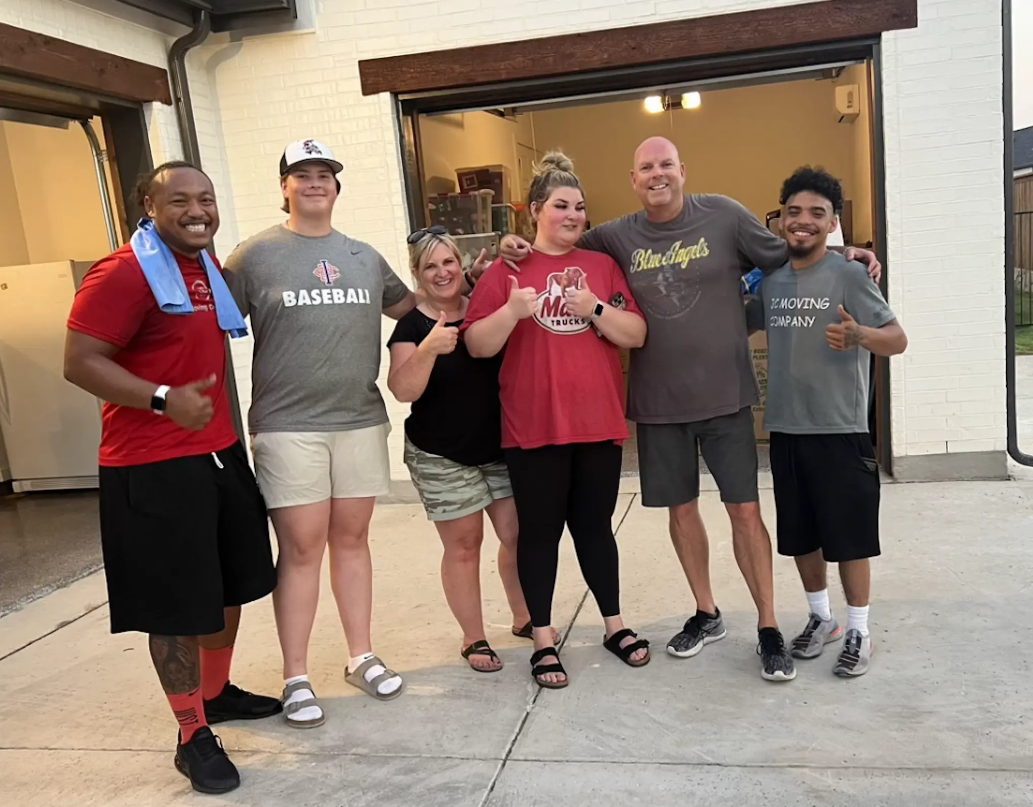 Movers wrapping and protecting furniture